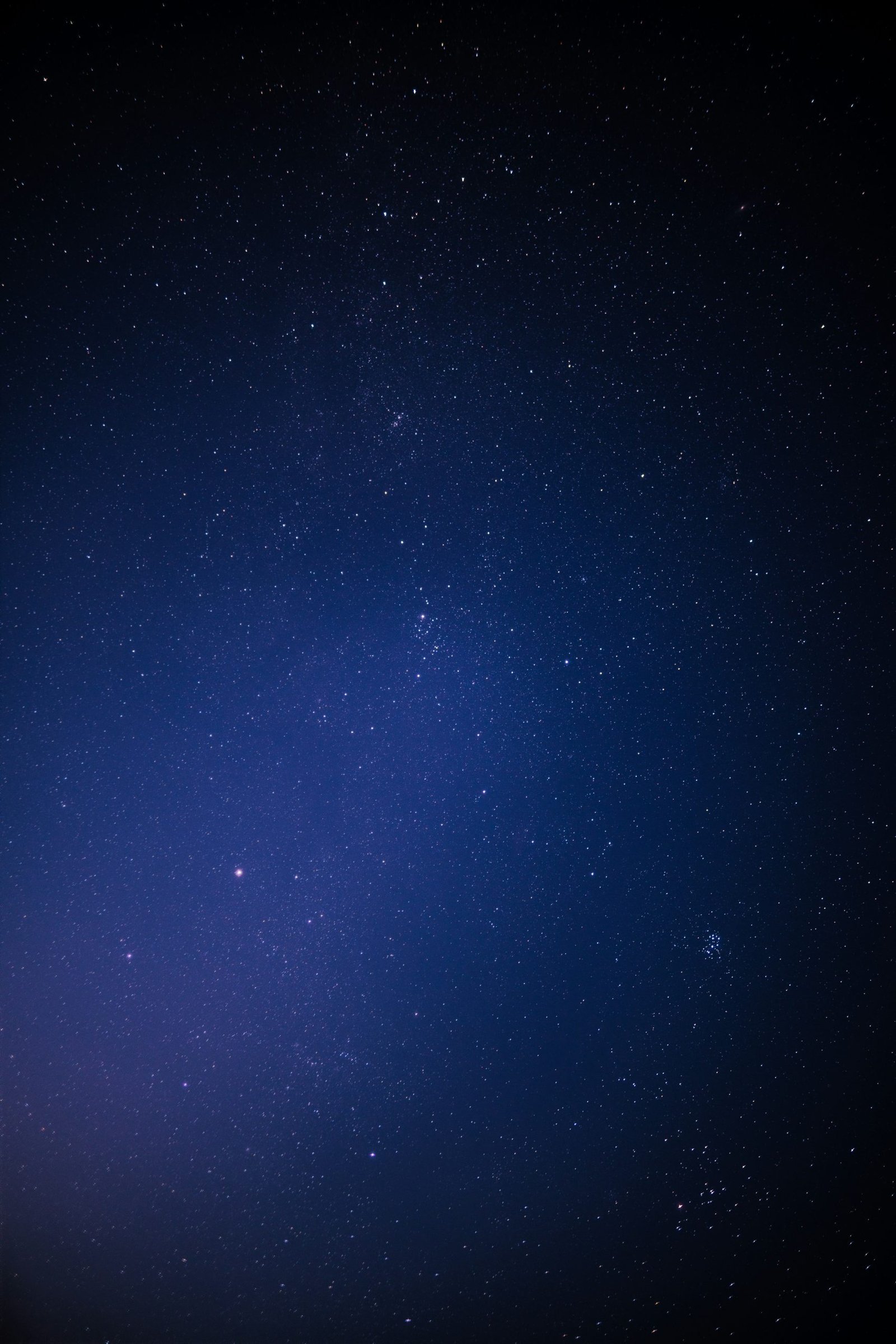 blue sky with stars during night time